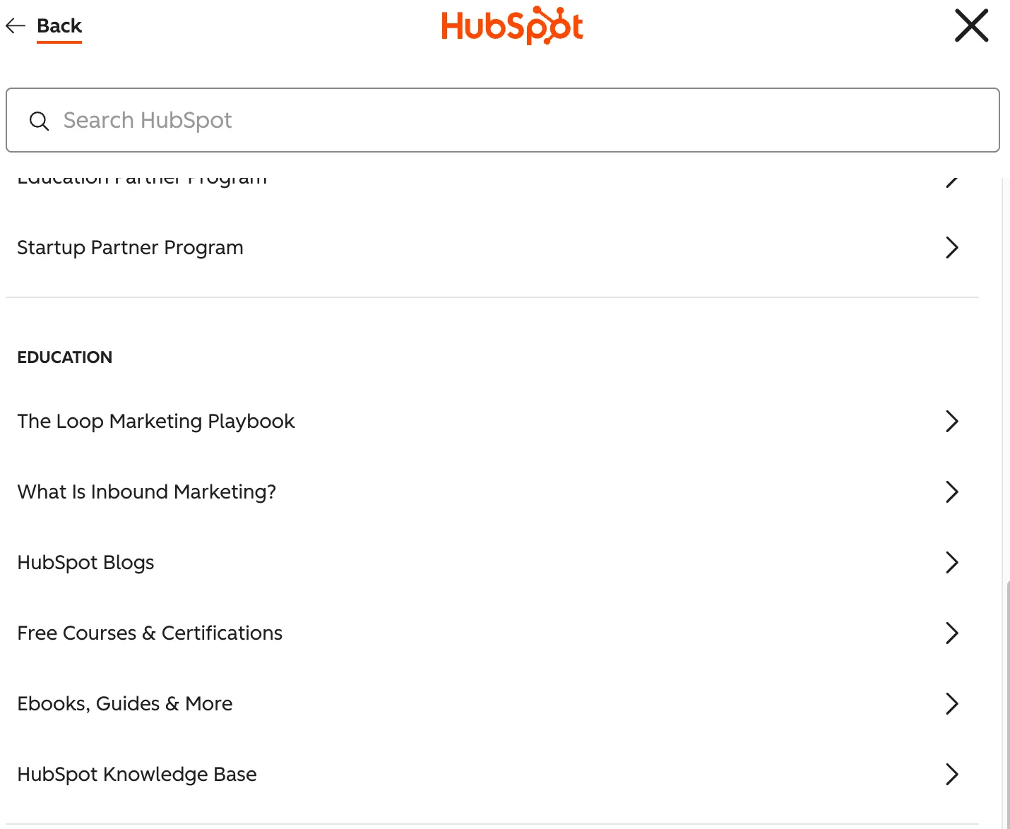 Screenshot of HubSpot&#39;s resource library featuring free blogs, ebooks, guides, certifications, and educational marketing content.